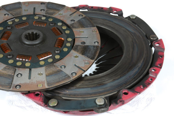 The scorched areas on this clutch disc show the effect of heavy acceleration. Even the best single disc-clutches eventually overheat and destroy themselves when exposed to excessive power. A dual-disc arrangement is always the 
better option for big power.