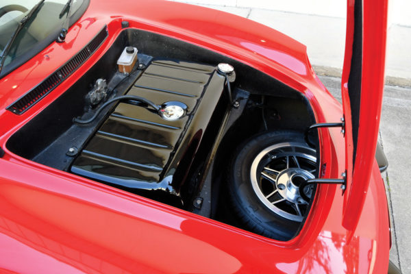  Under the forward-opening hood is the traditional Volkswagen 10-gallon gas tank and spare tire, adding weight to the front end for better handling.